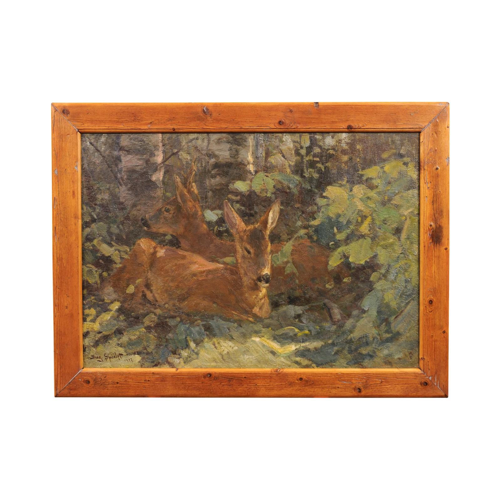 A German oil on canvas board painting from the early 20th century by August Specht, titled Deer in the Woods in old fir tree frame. Created in Germany during the first quarter of the 20th century, this oil on canvas board painting depicts the