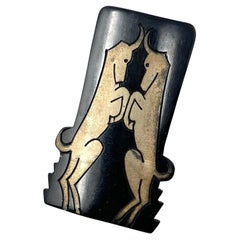 Auguste Bonaz Art Decó Años 20 Celuloide dorado Clip de vestido de gacela vintage