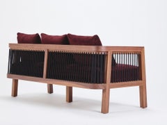 Auguste Contemporary Walnut and Tensioned Cord Sofa by Reda Amalou Design