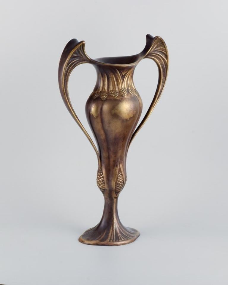 French Auguste Delaherche (1857-1940). Pair of large Art Nouveau bronze vases. For Sale