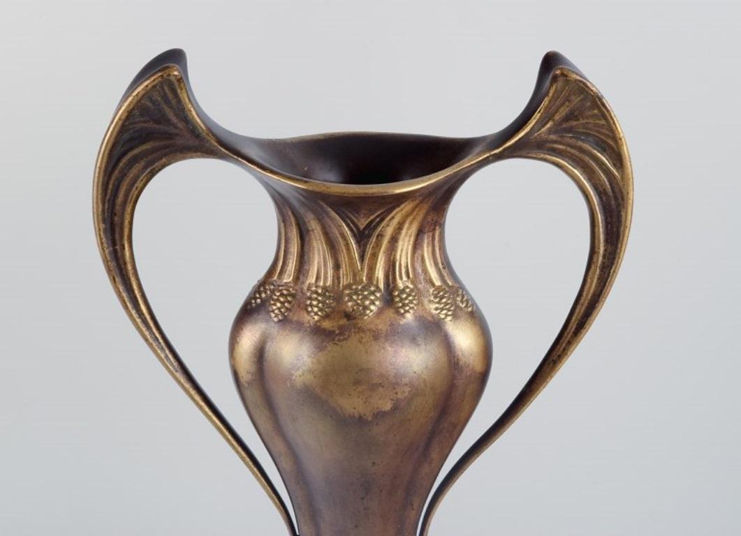 20th Century Auguste Delaherche (1857-1940). Pair of large Art Nouveau bronze vases. For Sale