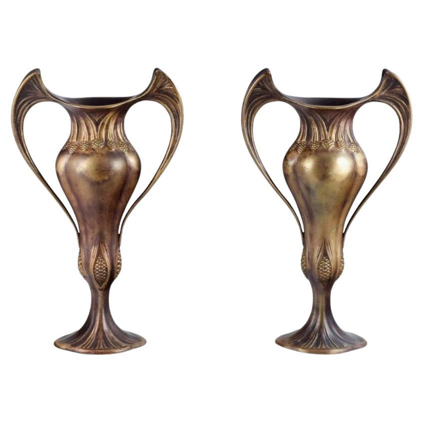 Auguste Delaherche (1857-1940). Pair of large Art Nouveau bronze vases. For Sale