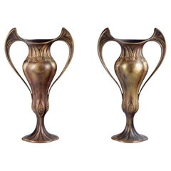 Antique Auguste Delaherche (1857-1940). Pair of large Art Nouveau bronze vases.