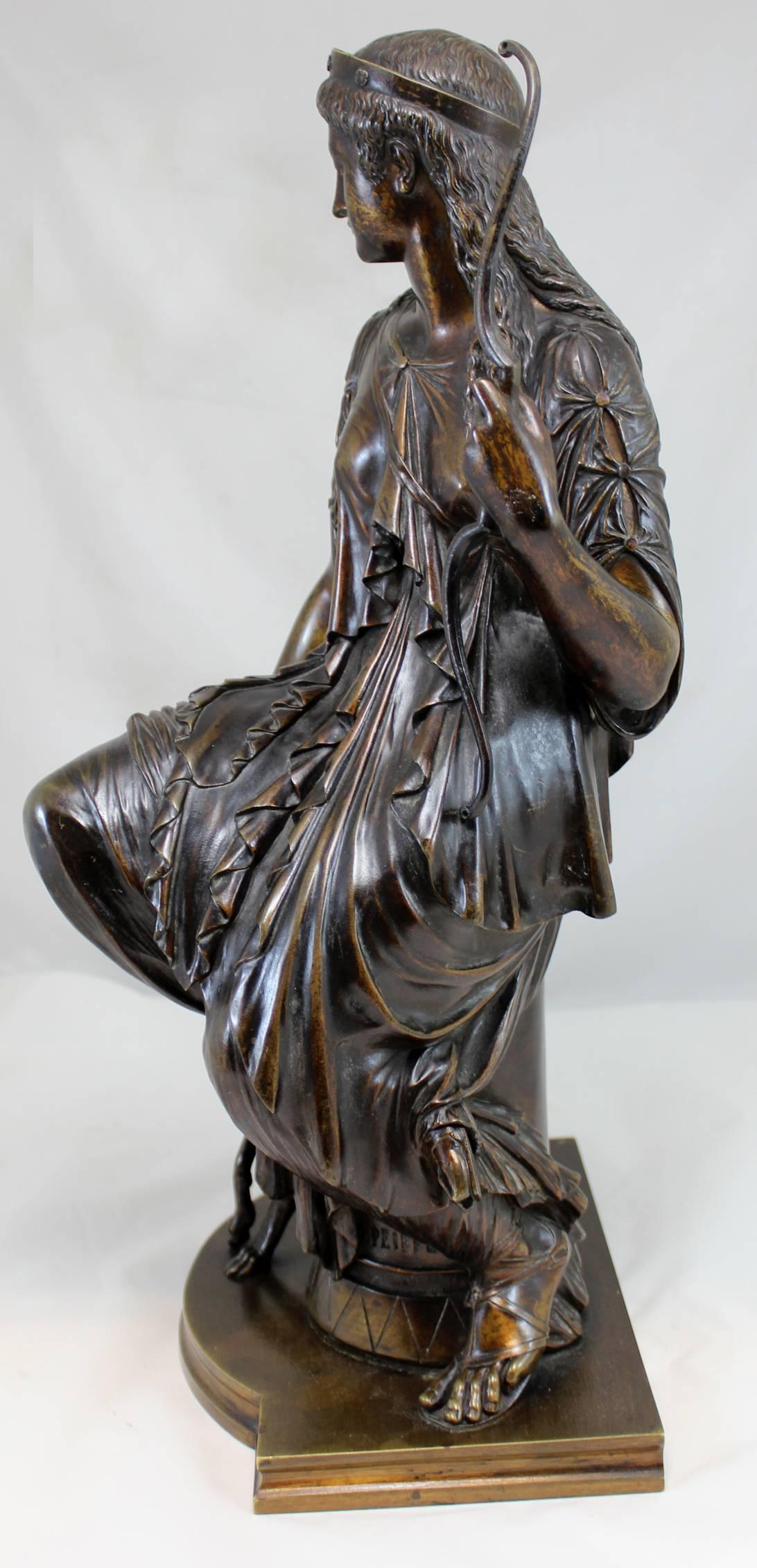 A fine cast patinated bronze classical sculpture of Diana the Huntress with her hound beside her, by French sculptor Auguste Joseph Peiffer (1832-1886), well known for his classical form bronze sculptures. 

Patinated cast bronze, signed near base