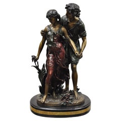Statua di Auguste Moreau in bronzo e marmo con scultura di amanti maschile e femminile