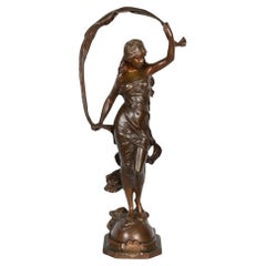 Escultura de "La brisa" de Auguste Moreau, siglo XIX.