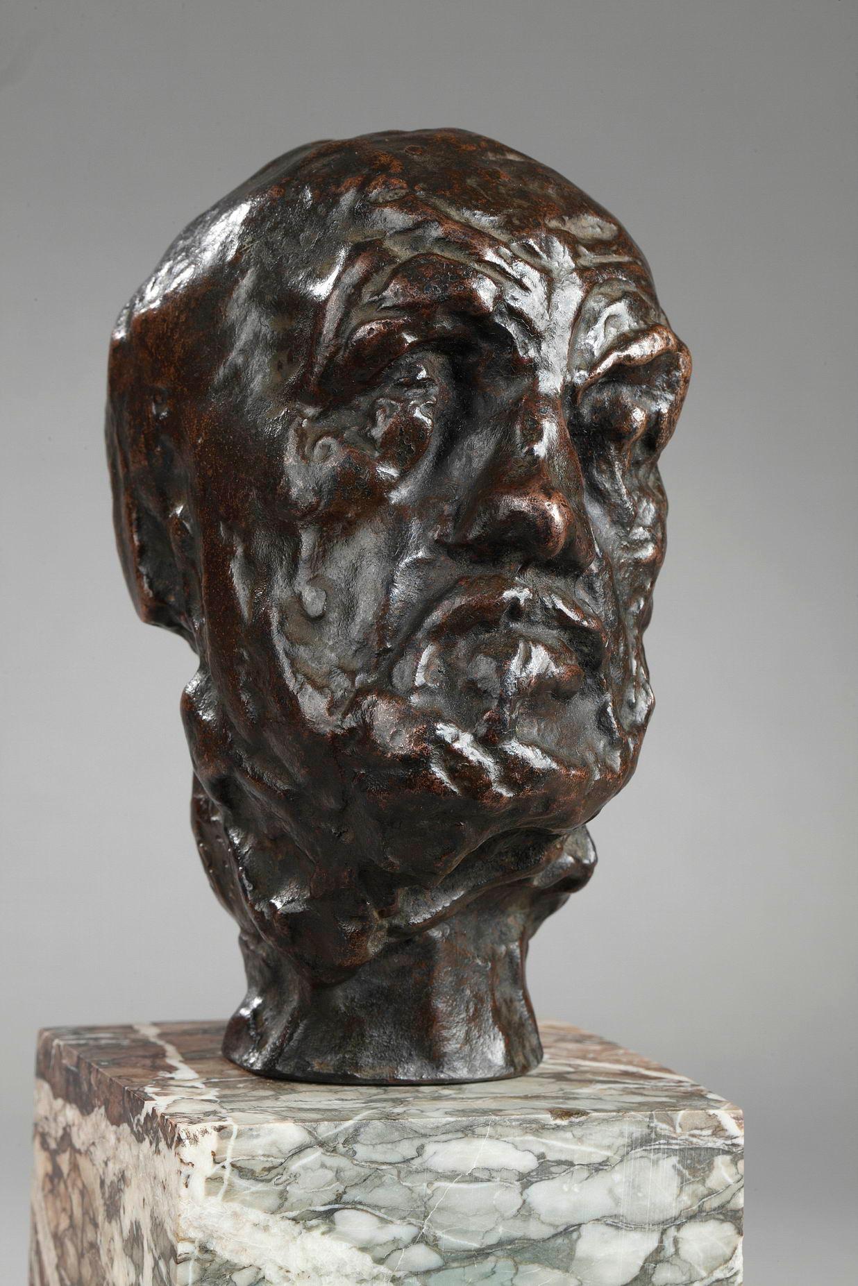 Petite tête de l'Homme au nez cassé
Small head of the Man with the broken nose
by Auguste RODIN (1840-1917)
Sketch for the Gates of Hell
Variant with symmetric neck

Bronze with black-dark brown patina
Signed 