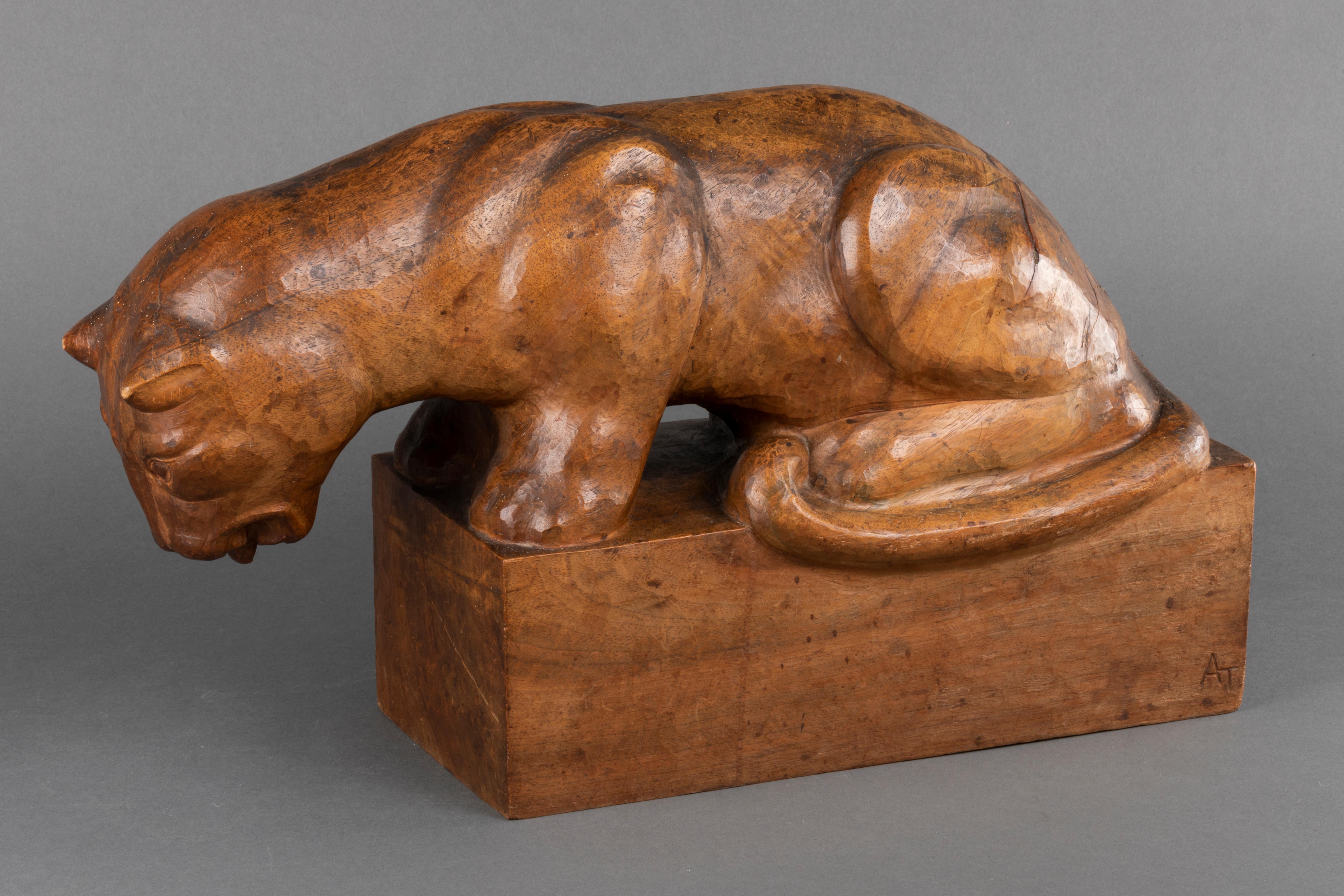 Patinated Auguste Trémont(attrib.) : Lion cub drinking, carved wood sculpture c.1950 For Sale