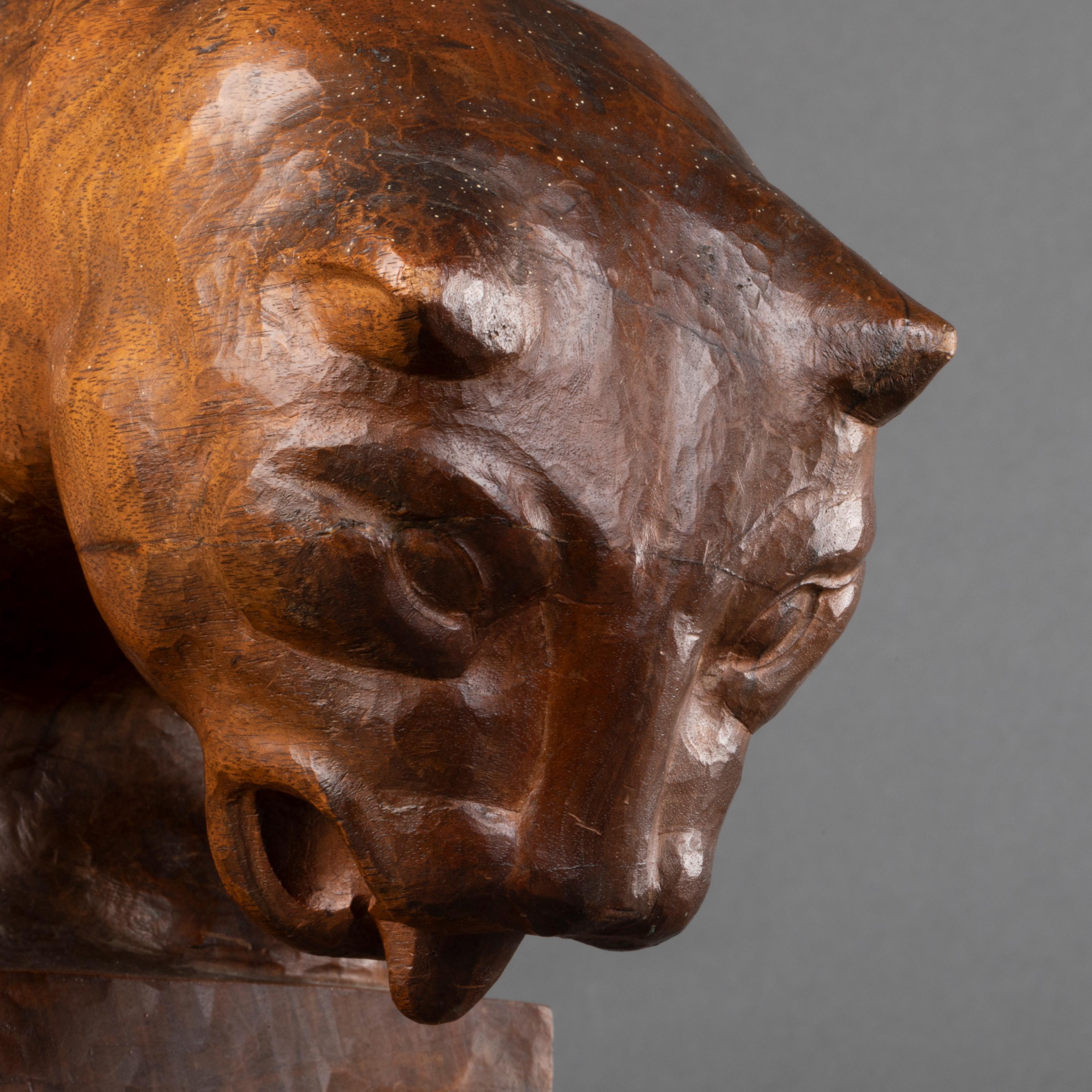 20th Century Auguste Trémont(attrib.) : Lion cub drinking, carved wood sculpture c.1950 For Sale