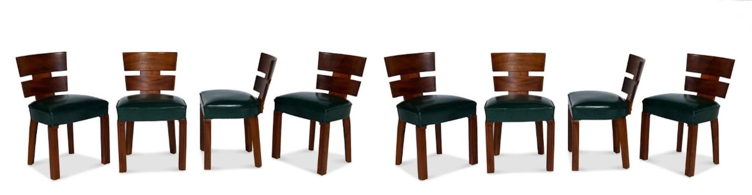 Ensemble moderniste de 8 pièces en acajou  Chaises de salle à manger d'Auguste Vallin garnies de cuir vert, vers 1930.