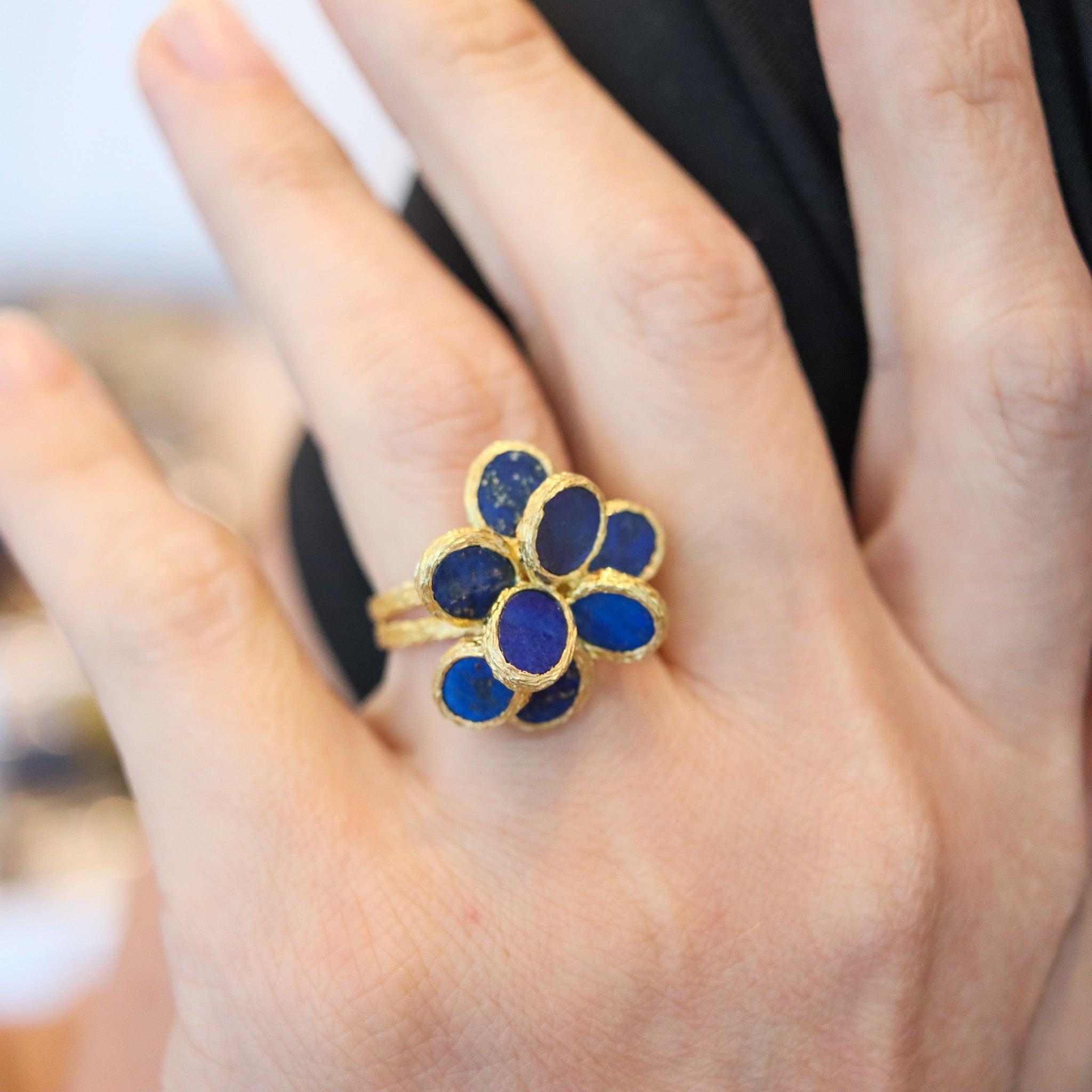 Cocktail ring designed by Augustin Julia Plana (1934-1979) for Simon Schlegel.

This is a very rare and unusual cocktail ring, created in the city of Bern Switzerland by the artist jeweler Augustin Julia-Plana, for Simon Schlegel, back in the late