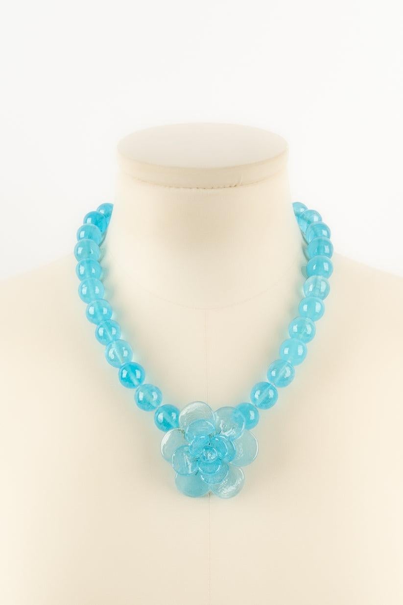 Augustine - (Made in France) Camellia necklace in blue glass paste.

Additional information:
Condition: Very good condition
Dimensions: Length: from 44 cm to 49 cm

Seller Reference: BC16