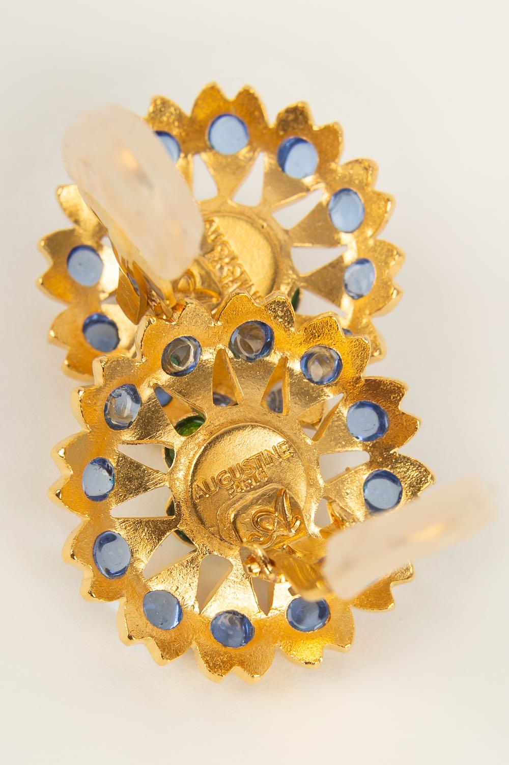 AUGUSTINE - Boucles d'oreilles à clip en métal doré et pâte de verre.

Condit :
Très bon état.

Dimensions :
Diamètre : 3 cm

SKU:BO372

Augustine
La maison de couture Augustine, fondée par Thierry Gripoix, est réputée pour ses créations modernes et