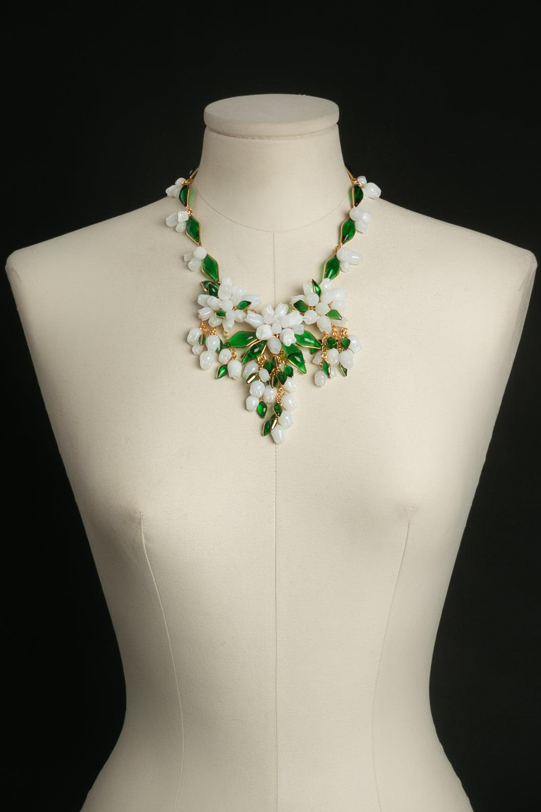 Augustine (Made in France) Large bib necklace in gilded metal and glass paste representing lily of the valley.

Additional information: 
Dimensions: Length: 42.5 cm to 49 cm (16.73