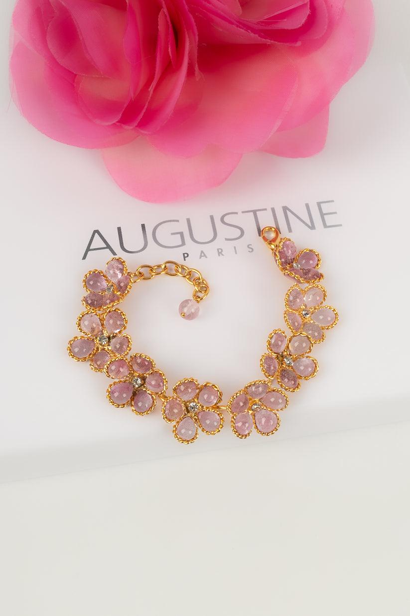Augustine - Gold metal bracelet, pink glass paste and strass.

Additional information:

Dimensions: 
Length: from 16 cm to 19 cm

Condition: 
Very good condition

Seller Ref number: BRA105