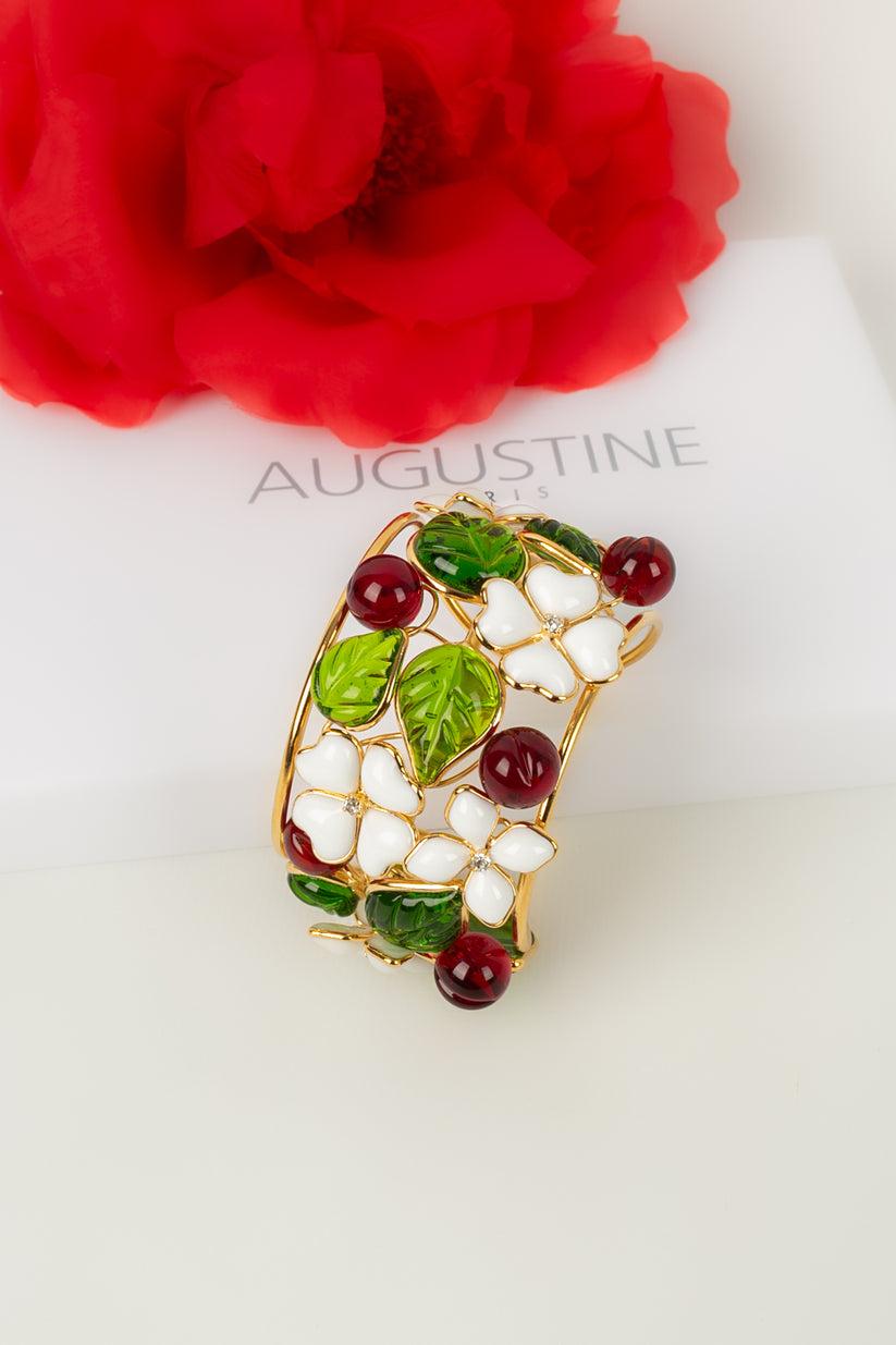 Augustine - (Made in France) Cuff bracelet in gold metal, glass paste and rhinestones.

Additional information:

Dimensions: 
Circumference: 13.5 cm 
Opening: 3 cm 
Width: 4 cm

Condition: 
Very good condition

Seller Ref number: BRA26