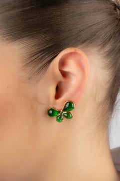 Augustine Golden Metal Butterfly Earrings with Dark-Green Glass Paste