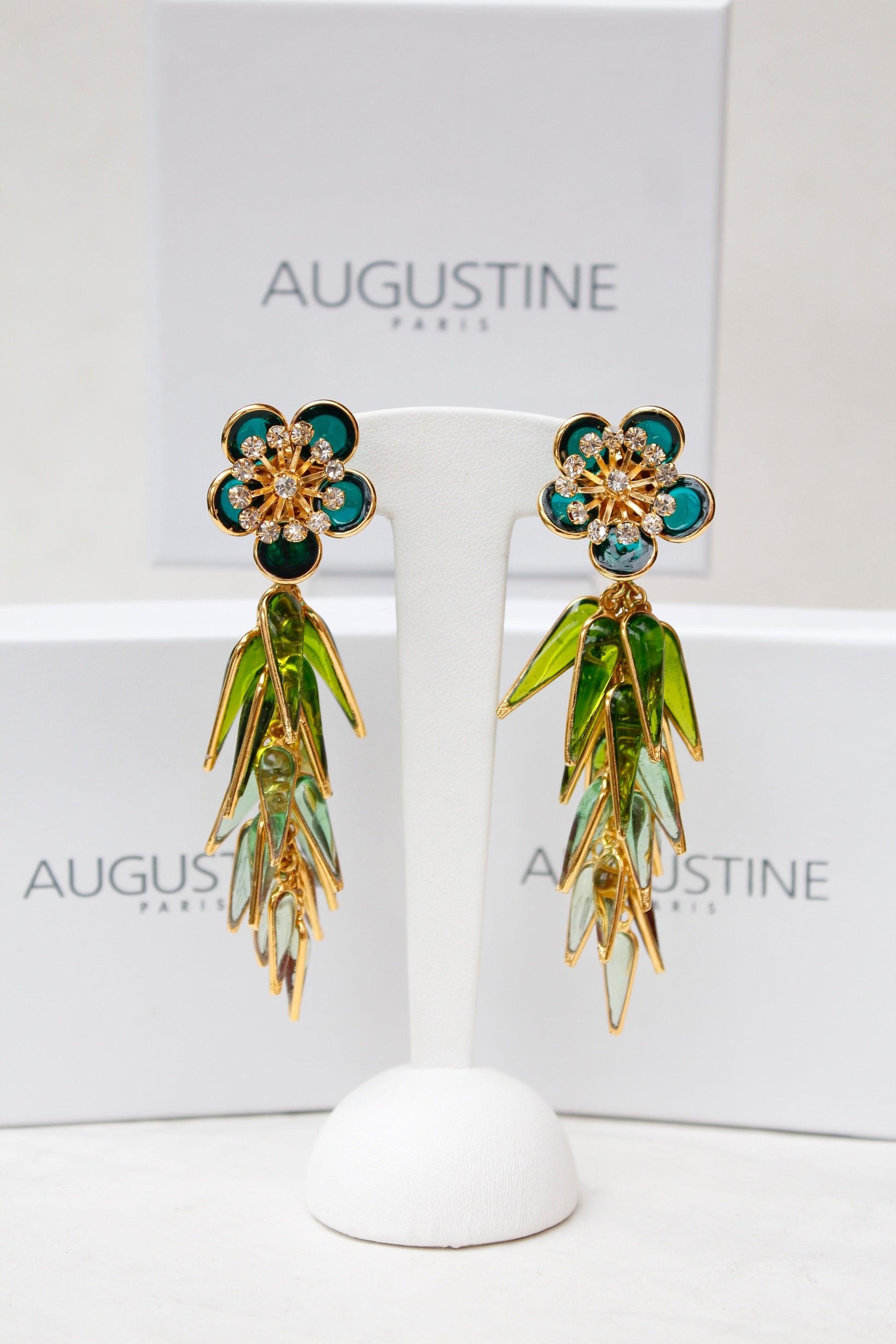 Augustine - (Made in France) Golden metal earrings with glass paste and rhinestones.

Additional information:
Condition: Mint condition
Dimensions: Length: 9 cm (3.54