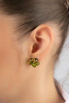 Augustine Golden Metal Flower Earrings with Rhinestones & Green Glass Paste