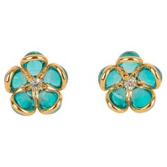 Augustine Golden Metal Flower Earrings With Sky-blue Glass Paste