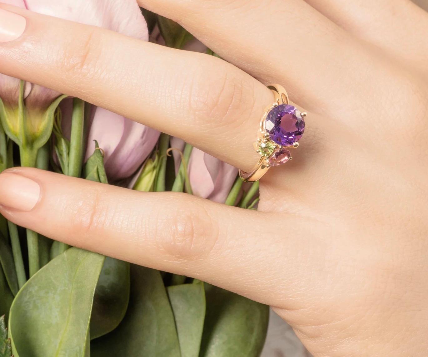 Inspired by the lush flora around Lake Como, this ring from the Como Collection features deep purple amethyst with fresh green peridot and pretty pink tourmaline , set in 9ct yellow gold. Our Como inspired London made, luxury jewellery collection