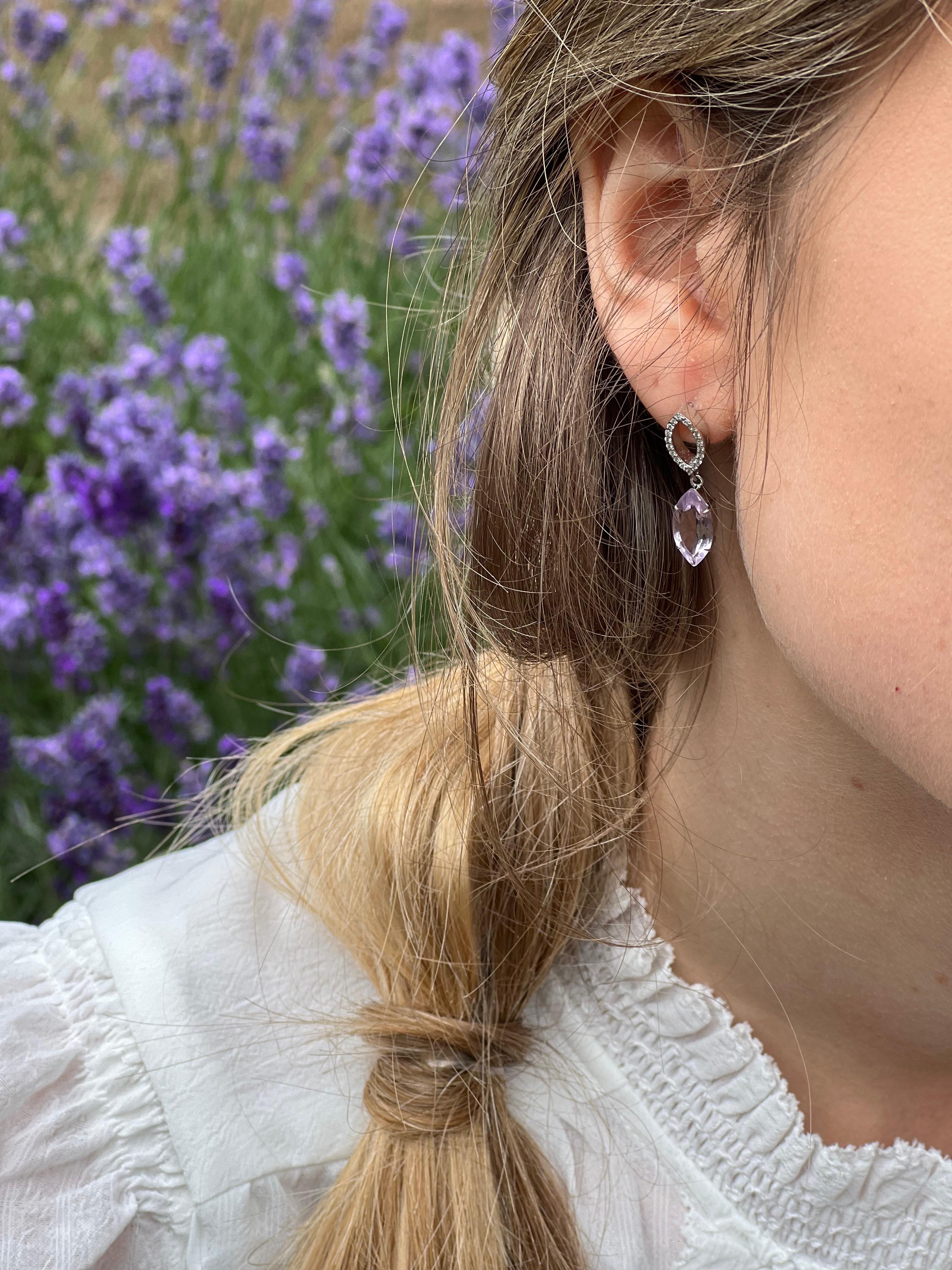 The delicate purple amethyst and diamond earrings in 9ct white gold, are the true representation of elegance. Perfect for day to day wear or for special events, these earrings suit every look. Marquise-cut Purple Amethyst and Diamond Earrings. Set