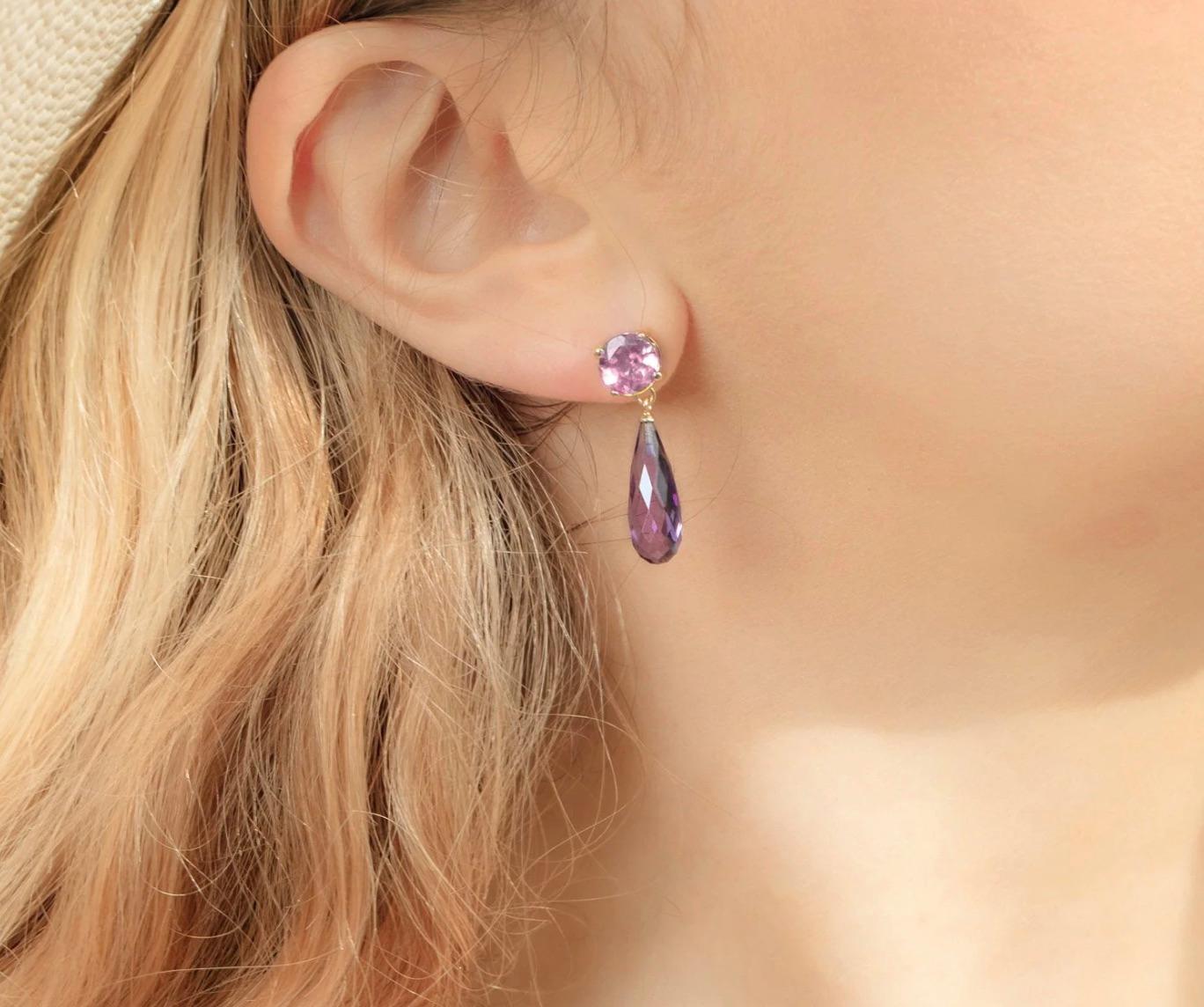 Inspired by the flora surrounding Lake Como, these earrings from the Como Collection feature pretty purple amethyst briolettes with vibrant pink tourmaline studs, set in 9ct yellow gold. Our Como inspired London made, luxury jewellery collection
