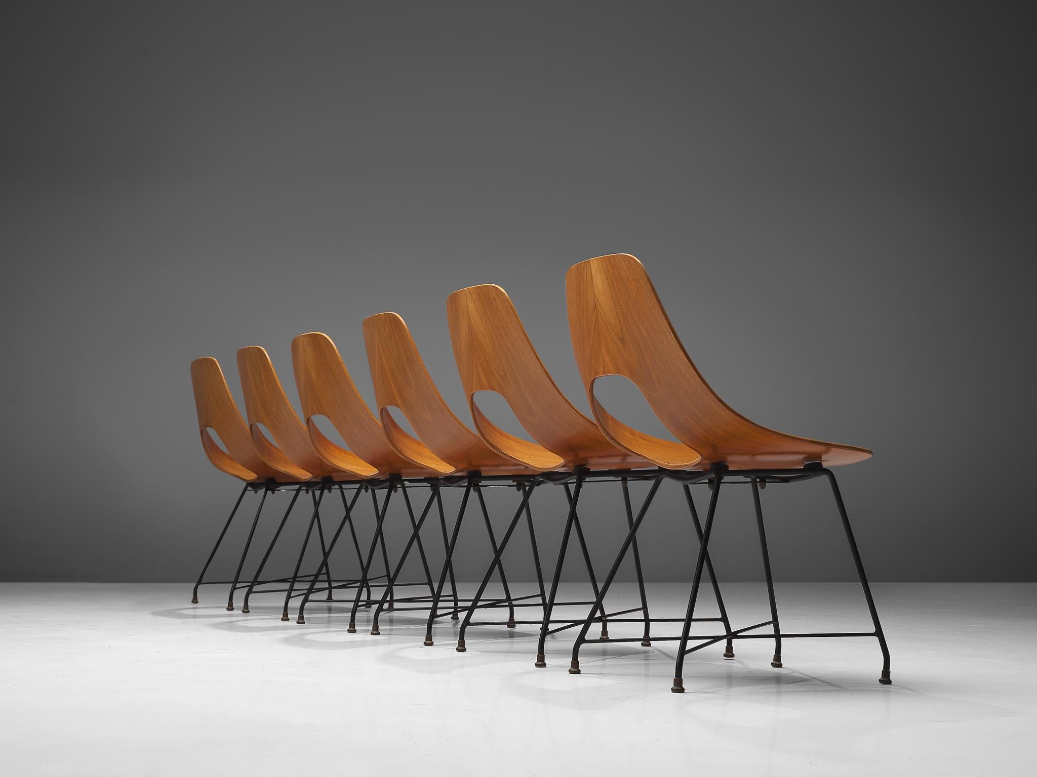 Augusto Bozzi for Saporiti, 'Ariston' dining chairs, teak, steel and brass, Italy, 1957.

Elegant 'Ariston' chairs designed by Augusto Bozzi for Saporiti. The chairs are made out of a solid bend plywood piece of teak in an elegant shape, which