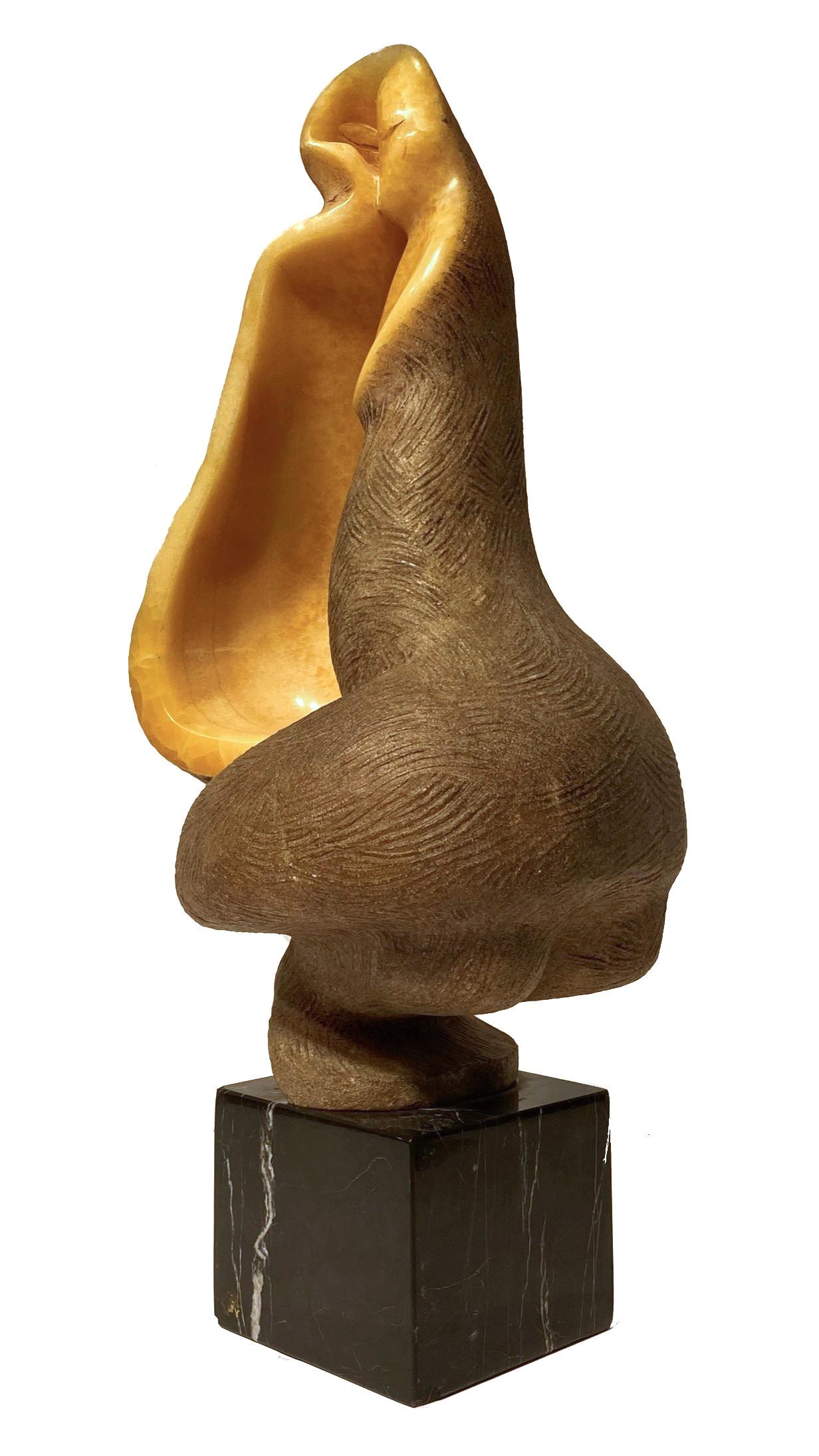 Wonderful abstract seashell form sculpture in onyx by the Mexican sculptor, 
Augusto Ortega Escobedo (1914-1995).