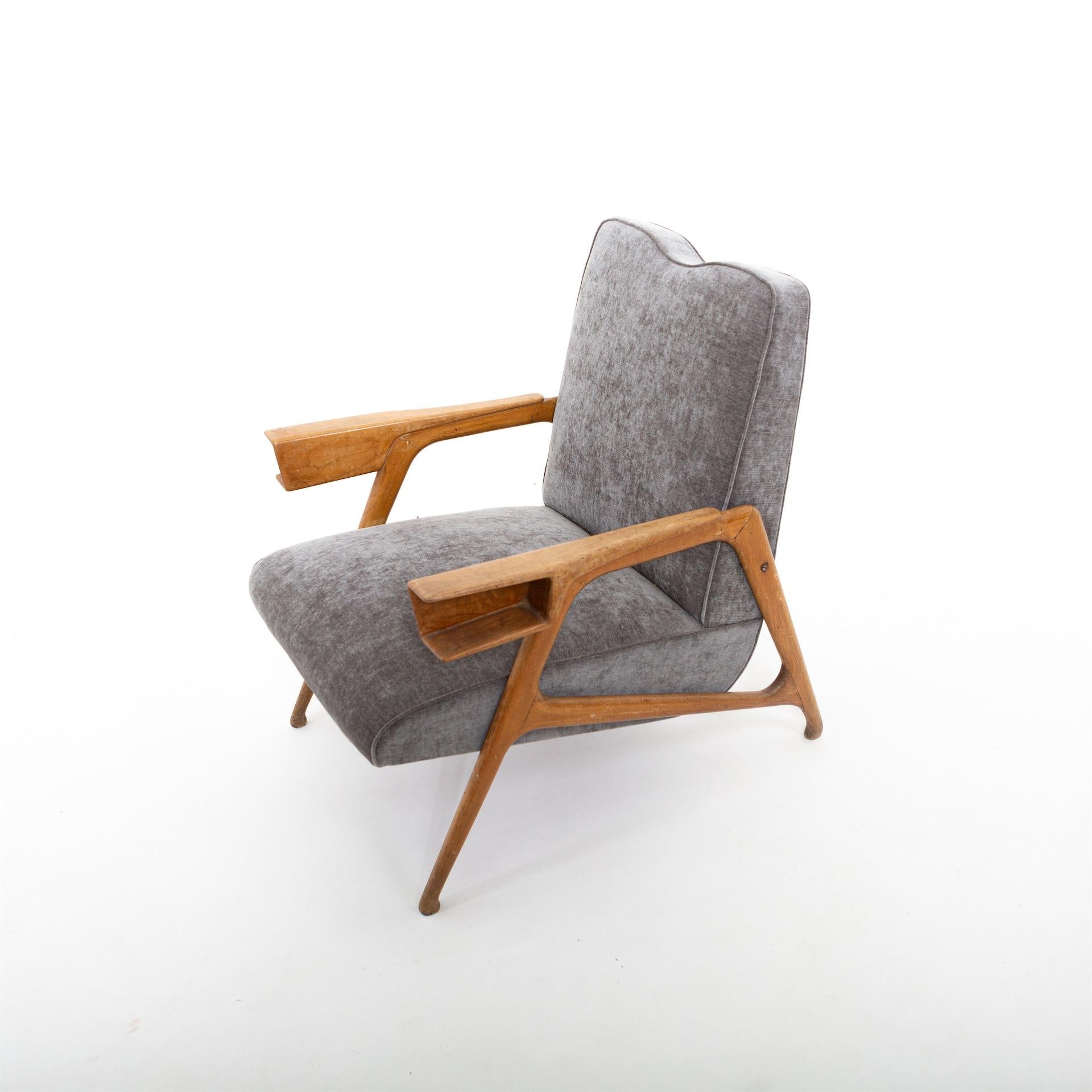 Armchair by Augusto Romano with wooden armrests and a grey velvet fabric cover.