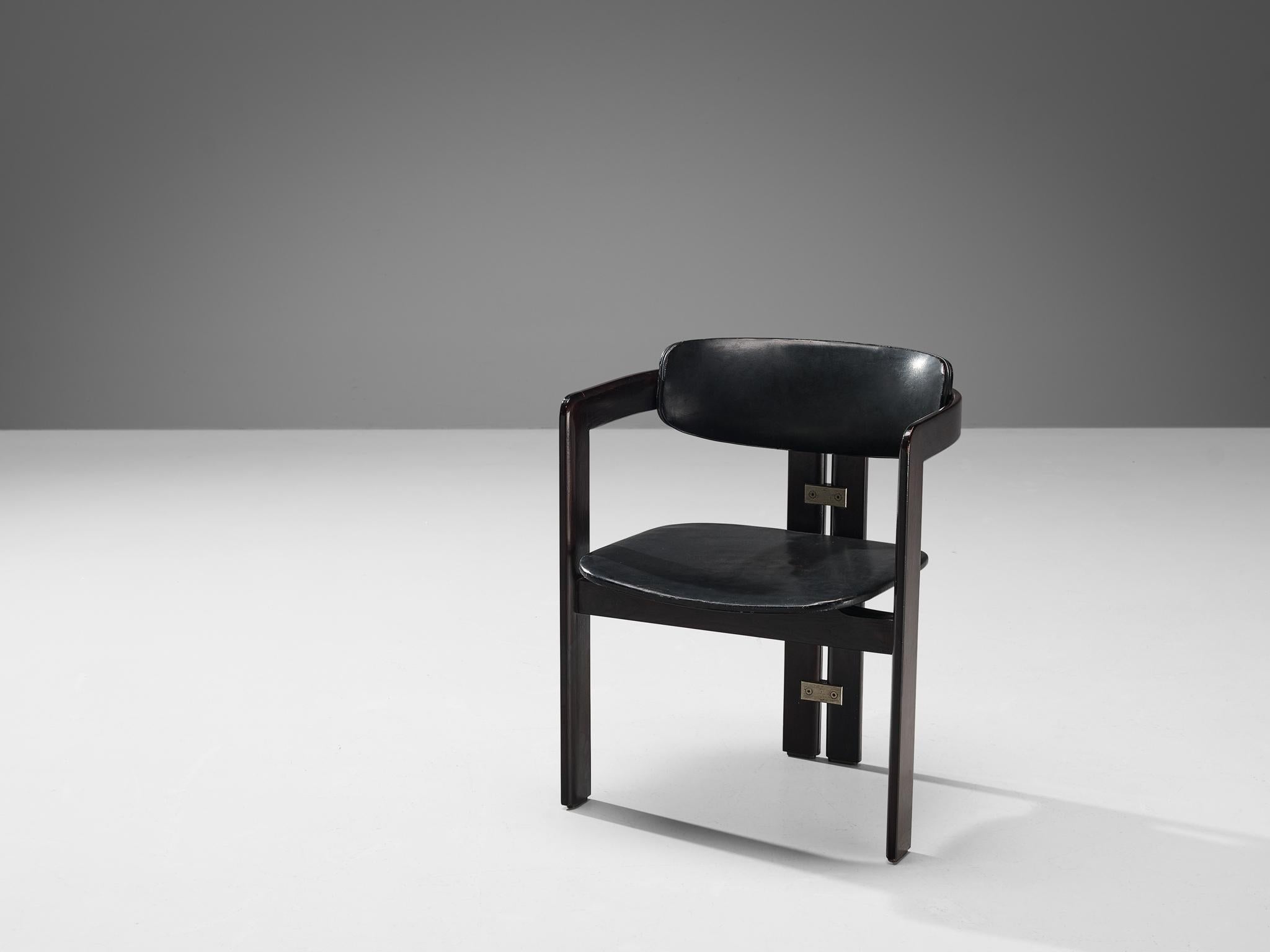 Augusto Savini for Pozzi, 'Pamplona' dining chair, lacquered wood, fabric, aluminum, Italy, 1965

The Pamplona armchair features a sleek black lacquered wooden frame and is upholstered in black leather for both the seat and backrest. Designed by