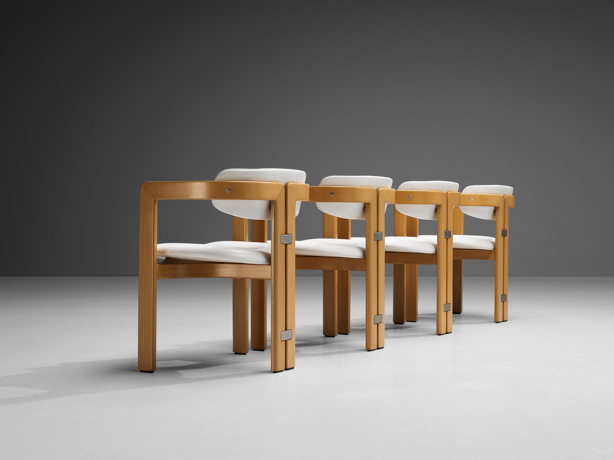 Augusto Savini for Pozzi, set of four 'Pamplona' dining chairs, lacquered wood, white leather upholstery, aluminum, Italy, 1965.

Set of four armchairs in lacquered wood and white leather upholstery. A characteristic design; simplistic yet very