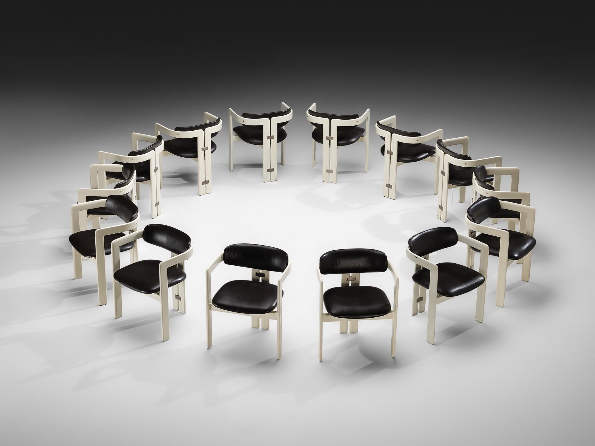 Augusto Savini for Pozzi, set of fourteen 'Pamplona' dining chairs, lacquered wood, leather, aluminum, Italy, 1965

'Pamplona' armchairs in off-white lacquered wood and dark brown leather. A characteristic design by Augusto Savini for Pozzi;