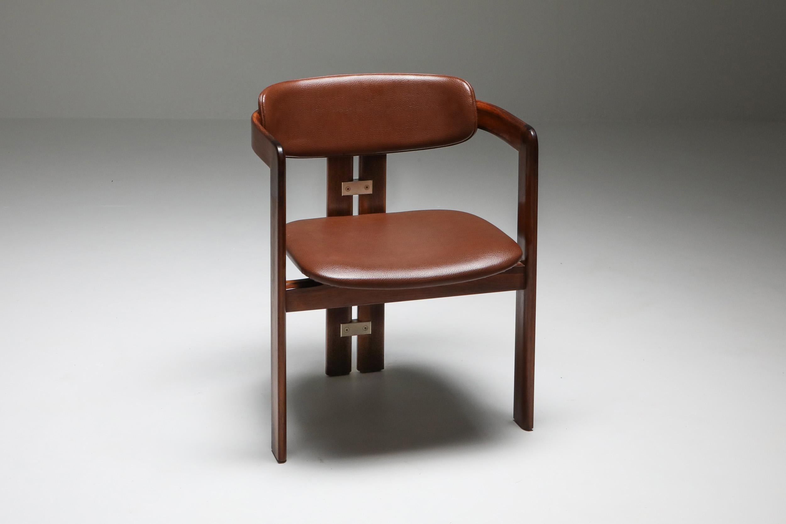 Augusto Savini, 'Pamplona' dining room chairs for Pozzi, rosewood and brown leather, Italy, 1965. 


These bentwood framed armchairs with aluminum elements on the back are quickly becoming new design classics.

 