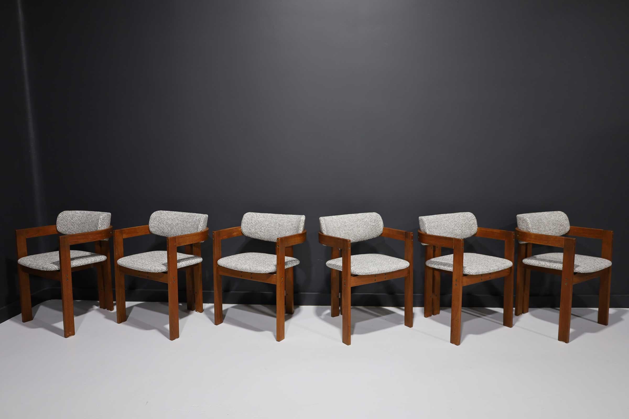 Newly upholstered in a woven texture with blacks, browns and whites. Six T-Back dining chairs in the style of Augusto Savini's 'Pamplona' dining chair and Afra & Tobia Scarpa's Pigreco T-Back chair.
