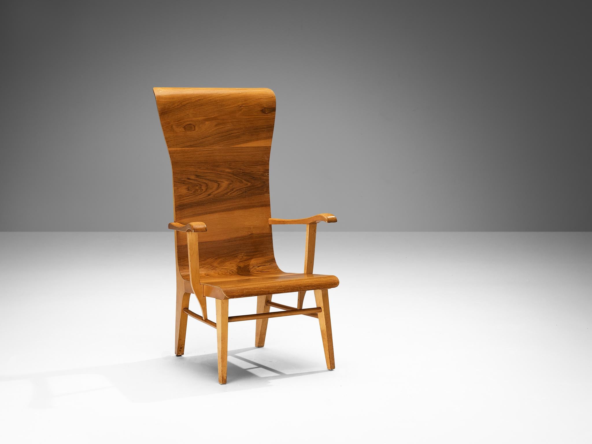 Auke Komter for Metz & Co, chair, beech, plywood, walnut, The Netherlands, 1930s

This stately chair was designed by Dutch Architect Auke Komter in the early 1930s. The armchair is made from a solid beech frame with bend plywood shell that flows