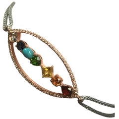 “Aura” a Chakras-Inspired 18 Karat Rose Gold, Diamonds and Gems Thread Bracelet