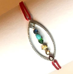“Aura” a Chakras-Inspired 18 Karat White Gold, Diamonds and Gems Thread Bracelet