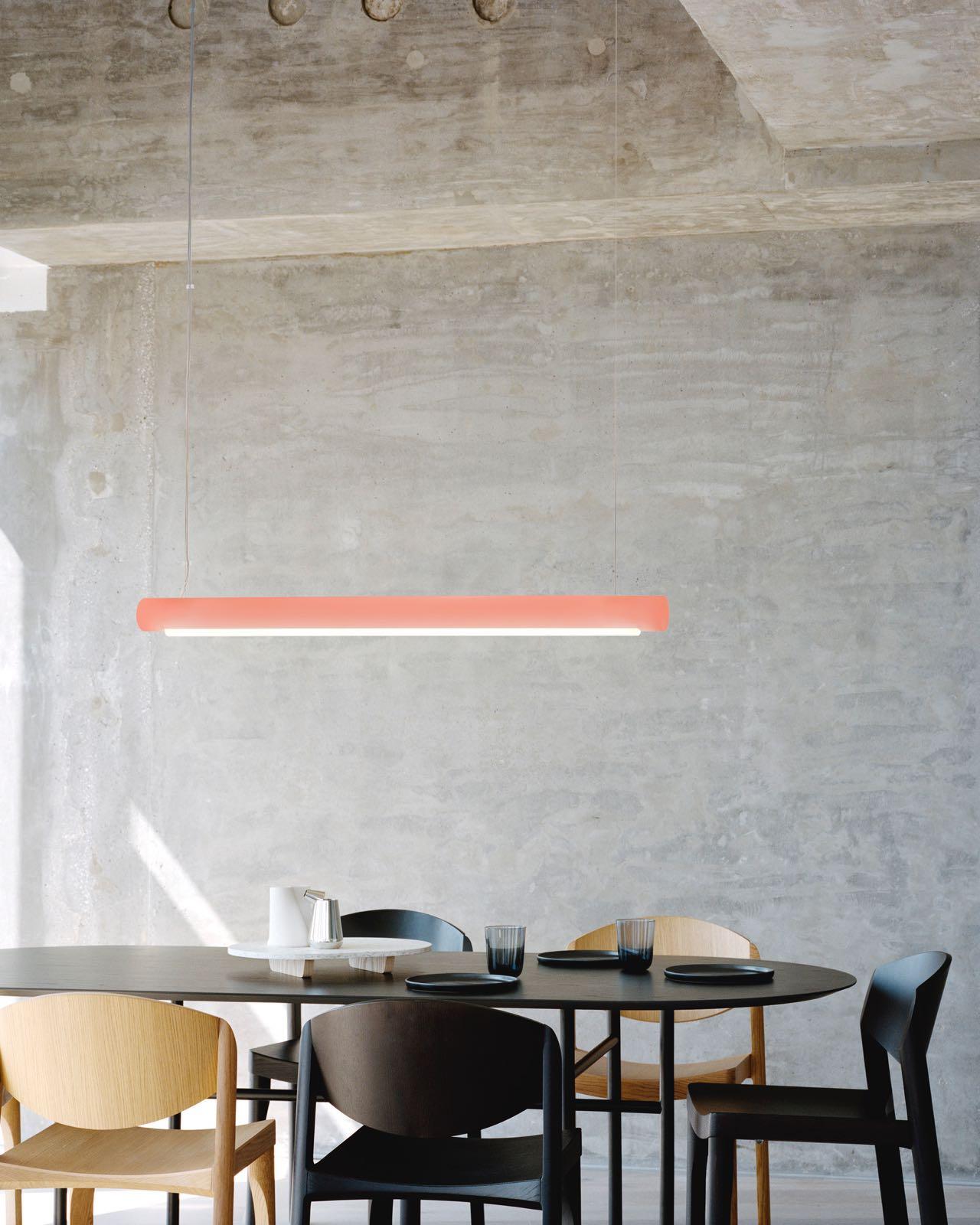 Harnessing Marcelis’ expertise in color, the suspended cylinder bar of the Aura Light can stand alone or work as part of a grouping. Over a metre in length, the design is made from a bio-epoxy resin, created using by-products from farming.
A