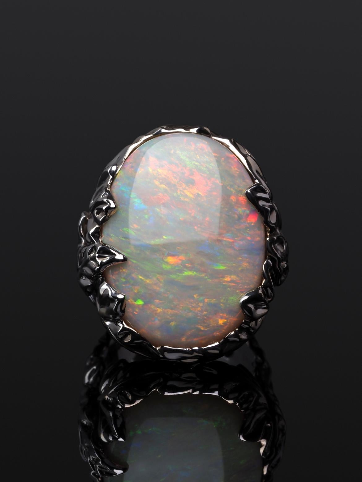 Aura ring with natural Australian Opal in 18K white gold
opal origin - Australia
ring size - 9 US
ring weight - 34 grams
opal measurements 0.2 x 0.79 x 0.98 in / 5 х 20 x 25 mm
opal weight - 20.8 ct