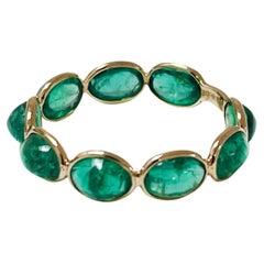 Aura Ring in Oval-Cut Emeralds and 18k Yellow Gold