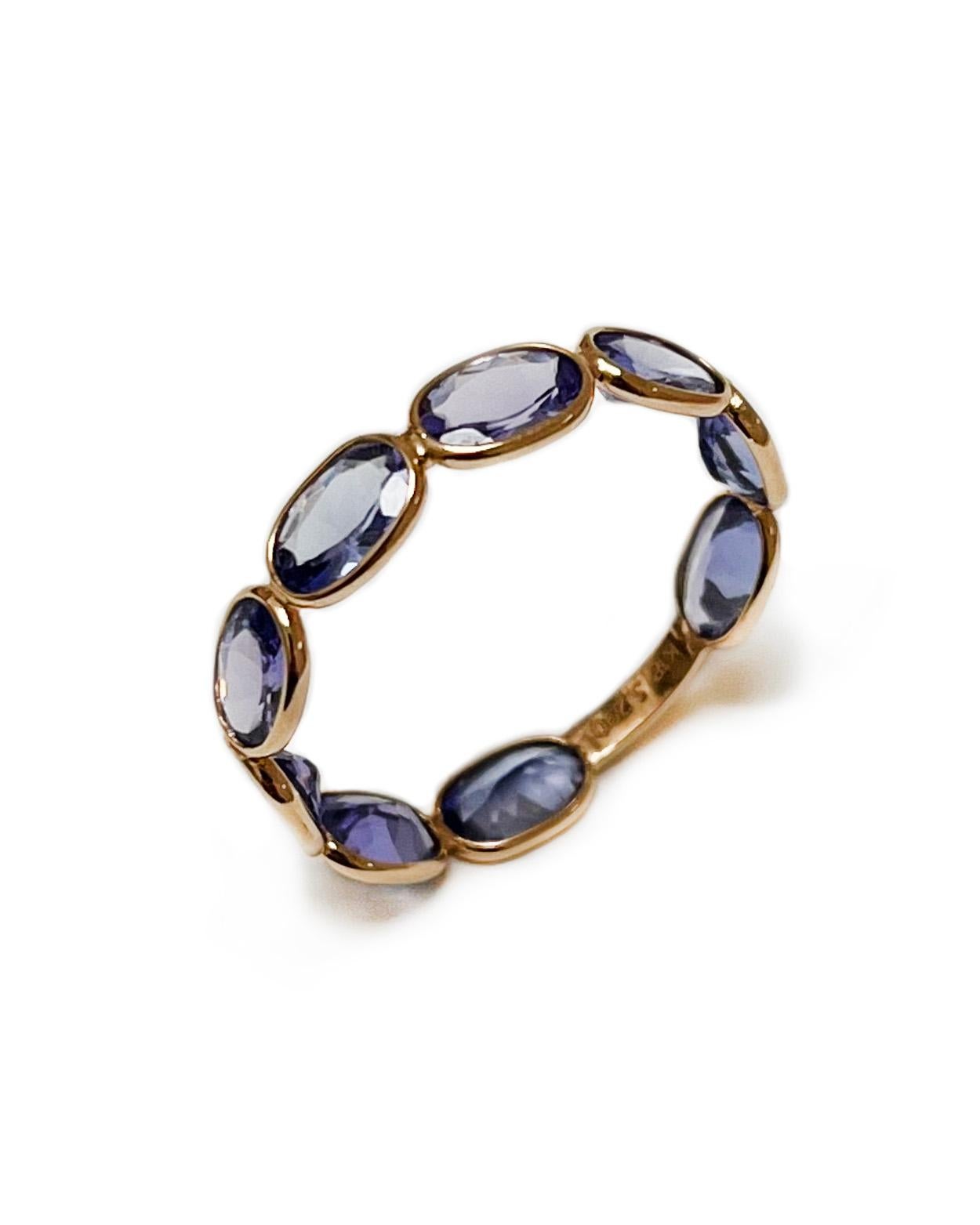 Intention: Stack it on

Dorian's Find: Slightly more violet than periwinkle, the Aura ring in tanzanite is a beautiful, delicate vintage find. We love the stone color against the outlined 18k yellow gold, and find the pattern as meticulous as petals