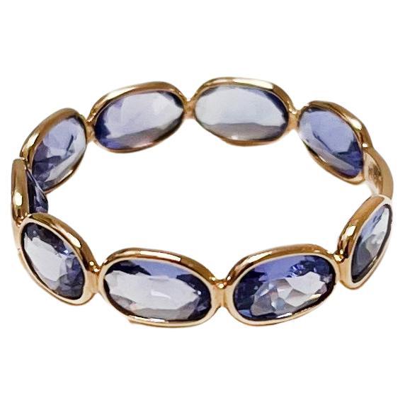 Aura Ring in Oval-cut Tanzanite and 18k Yellow Gold For Sale