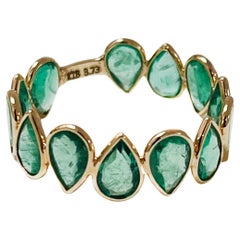 Aura Ring in Pear-Cut Emeralds and 18k Yellow Gold