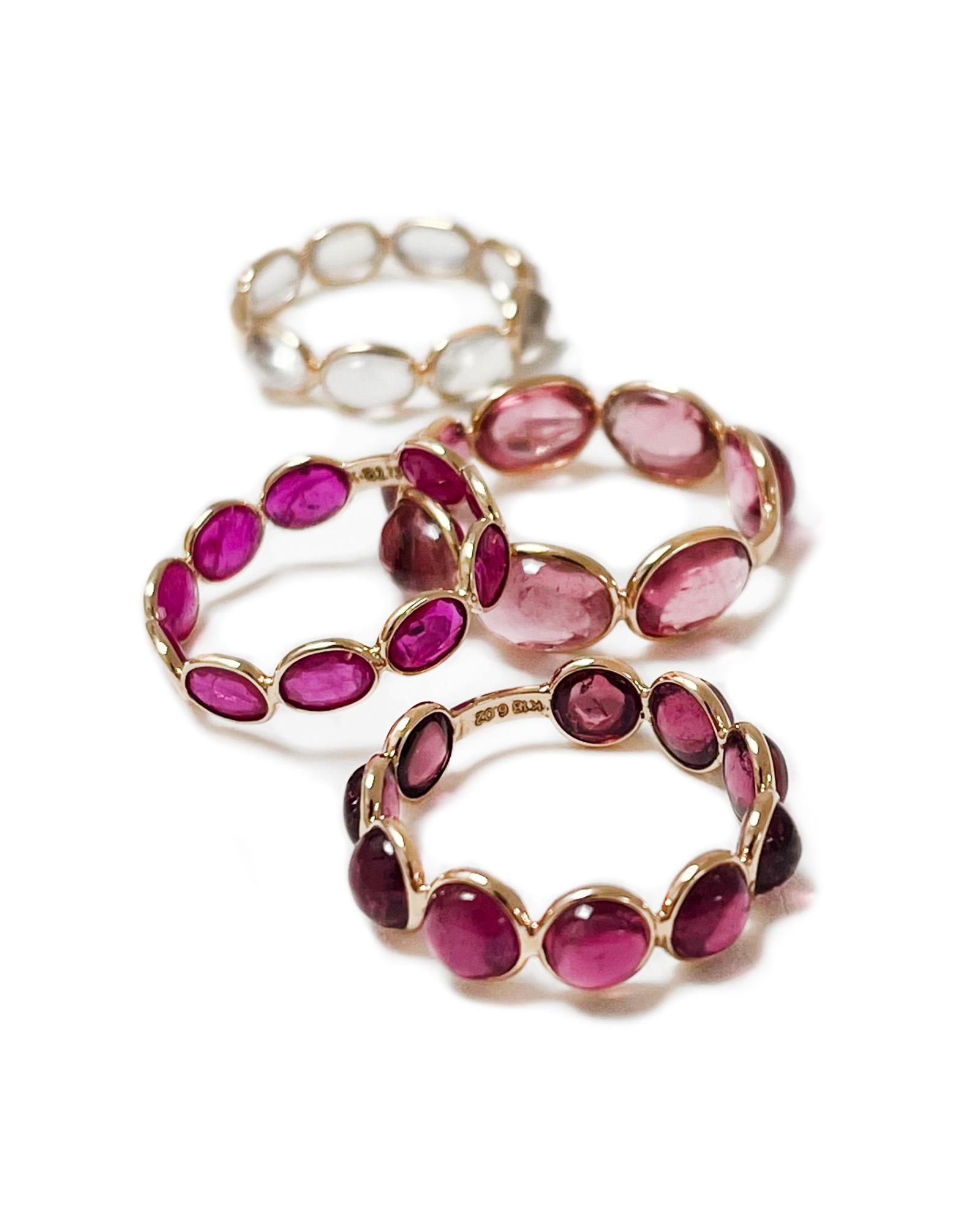 Intention: Stack it on

Dorian's Find: The Aura ring in rubellite is one our juiciest vintage finds. The rich berry color complements the 18k yellow gold beautifully, and the round cabochon cut means several stones can fit around the finger. The