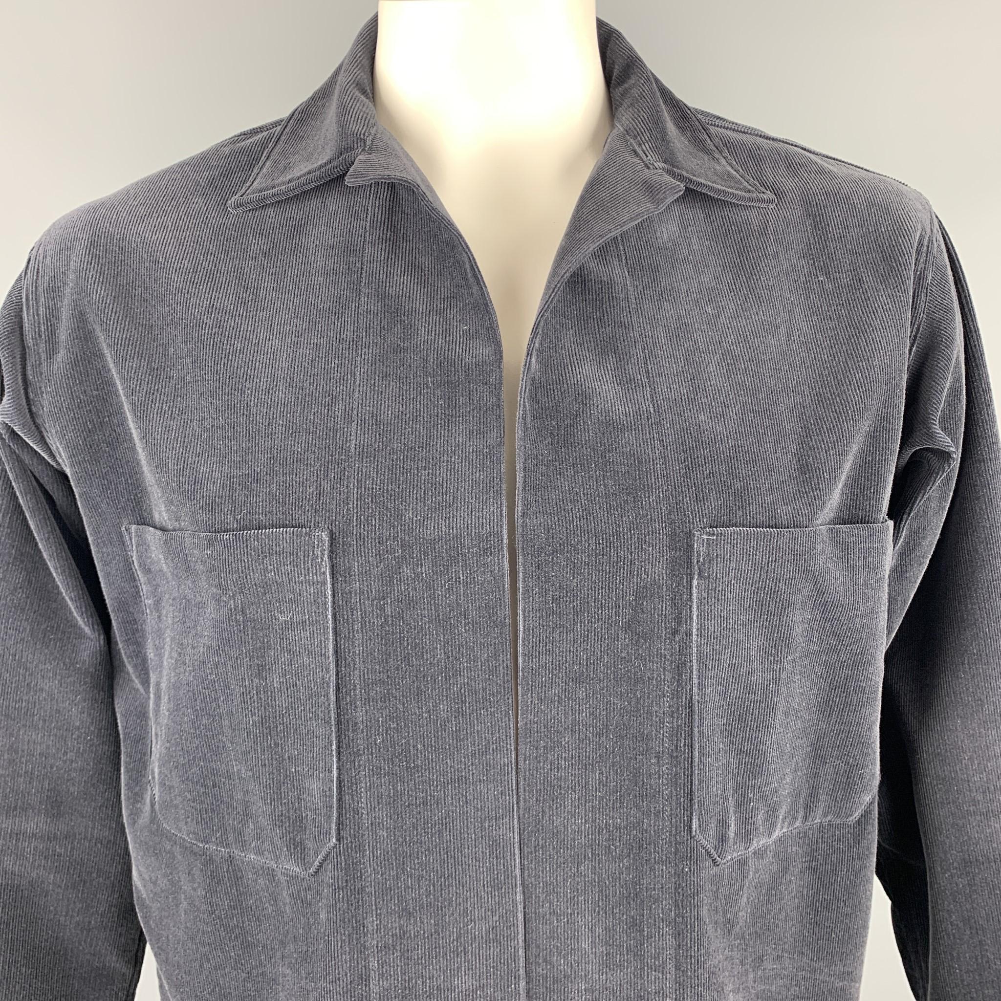 AURALEE jacket comes in charcoal corduroy with a pointed collar, open front, and patch pockets. Made in Japan.

Good Pre-Owned Condition.
Marked: JP 4

Measurements:

Shoulder: 19 in.
Chest: 46 in.
Sleeve: 23 in.
Length: 25 in.