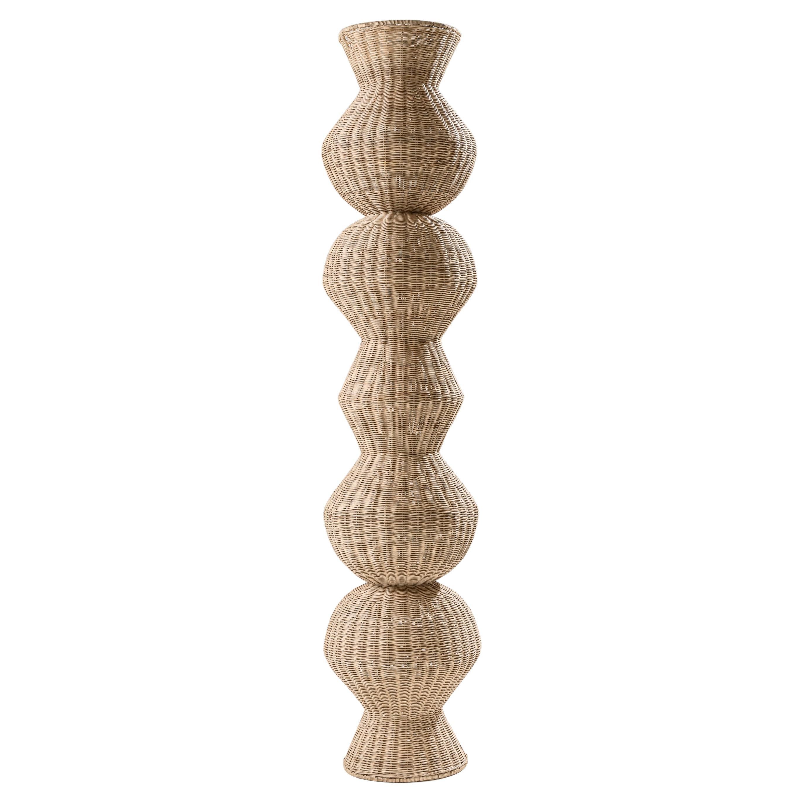 „Aurea“-Säule aus natürlichem Rattan.