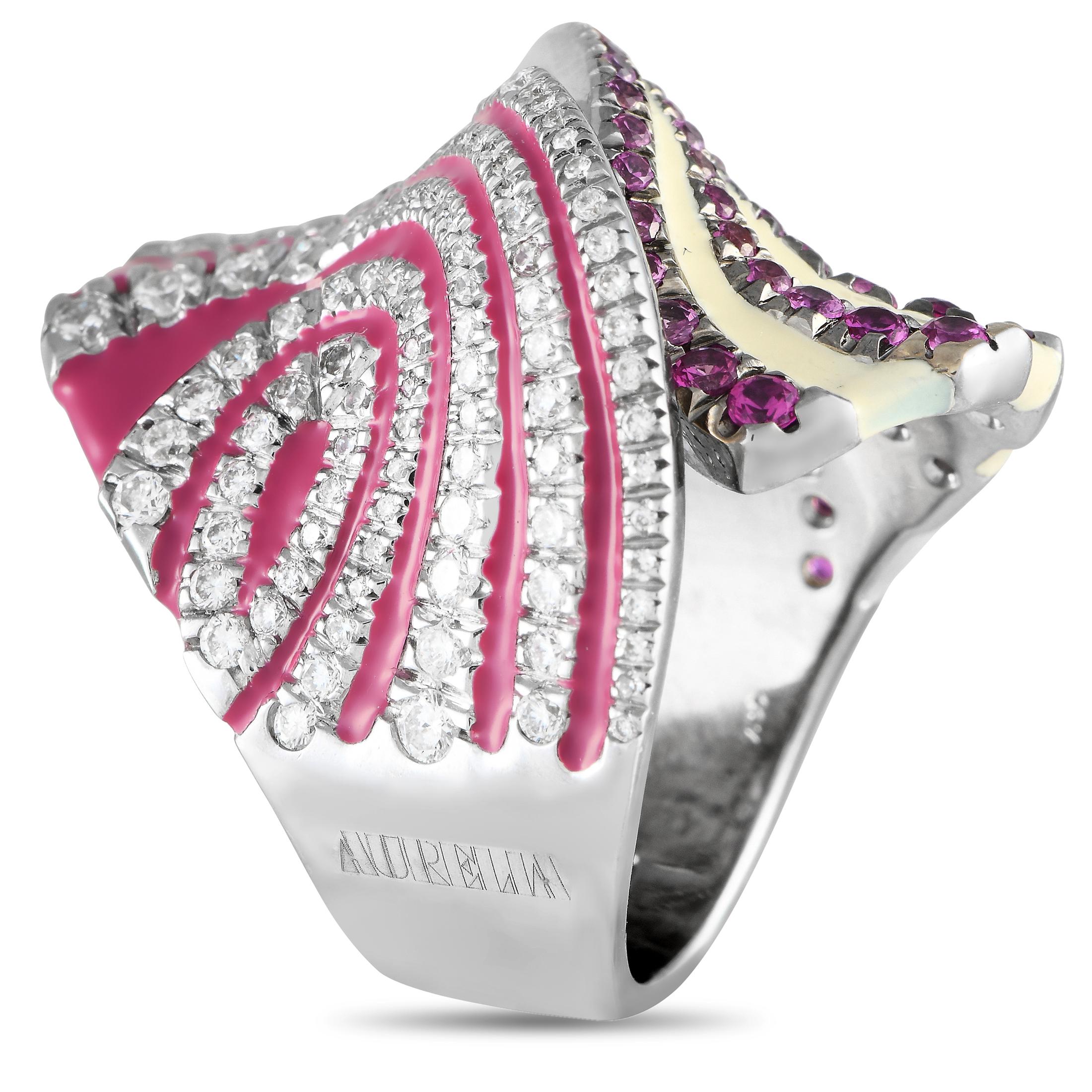 Draw eyes, spark conversations, and make a statement with this showy piece by Aurelia. This cocktail ring is fashioned from 18K white gold and features a pink and cream enamel finish. The wide and shapely band features fan-like shoulders detailed