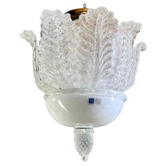Aureliano Toso Murano 1970s four-light art glass and gilded metal ceiling lamp.
