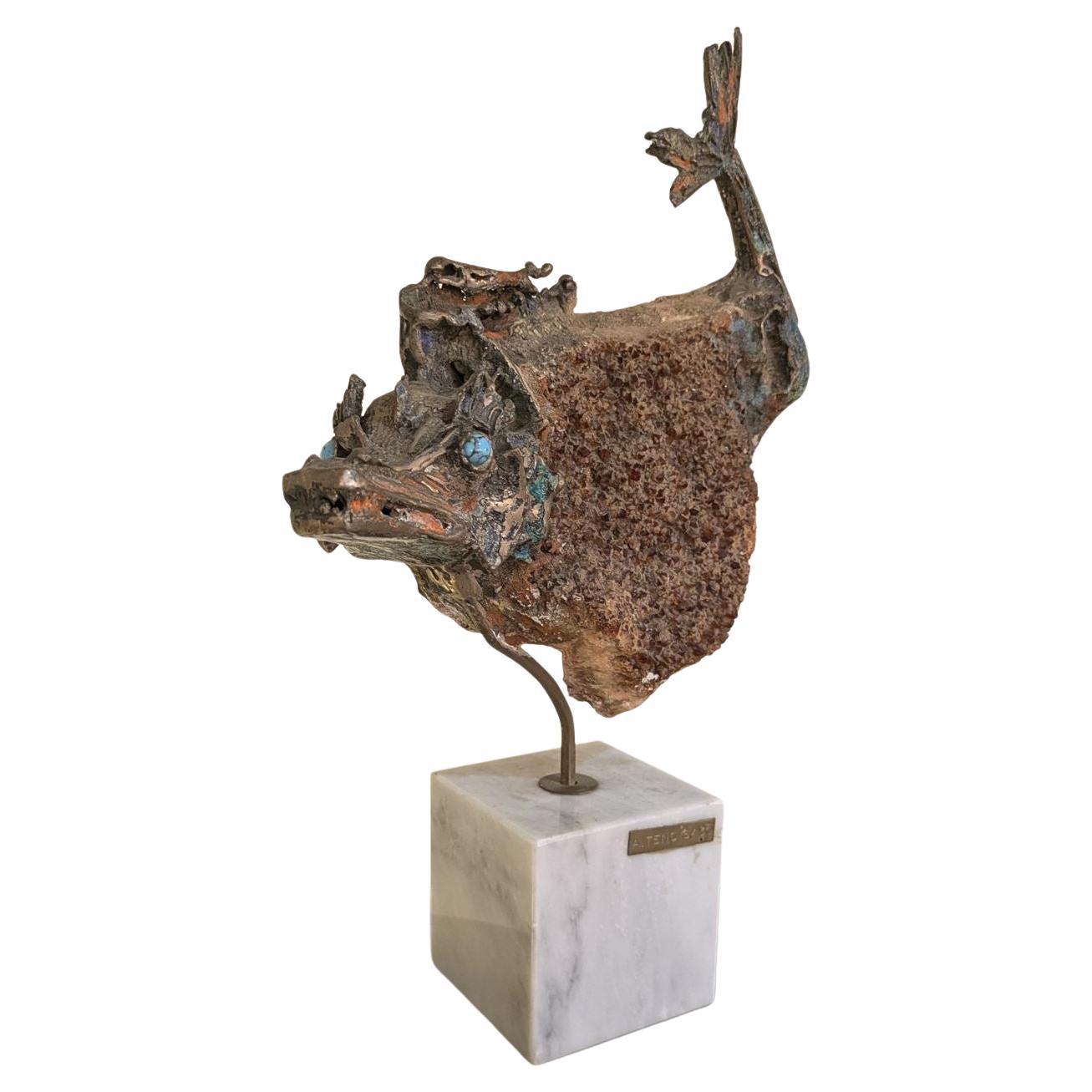 Aurelio Teno (1927/2013) Fischförmige Skulptur, Naturstein und Bronze